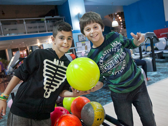 north-cyprus-pink-bowling-day-children-holding-bowling-ball