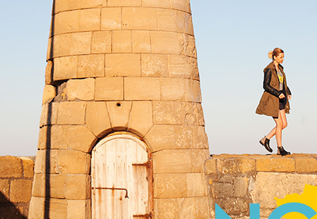 Woman and tower in Girne